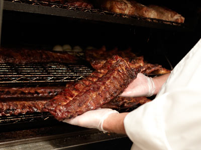 Fall-off-the-bone ribs coming out of the smoker.